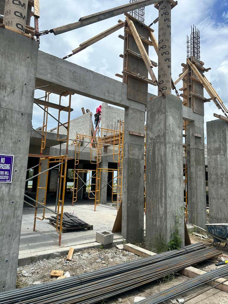 Concrete columns and structural beams under construction